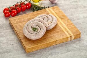 Natural spiral sausage for grill photo