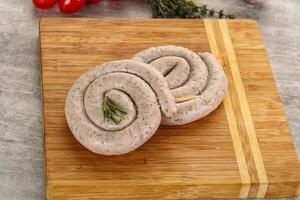 Natural spiral sausage for grill photo