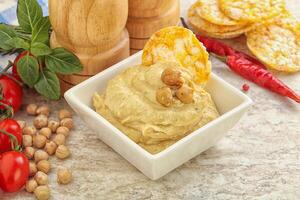 Natural organic chickpea hummus with olive oil photo