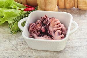 Marinated baby octopus seafood in the bowl photo