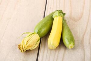 Raw baby organic zucchini heap photo