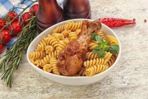 Roasted chicken leg with macaroni photo