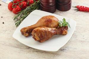 Roasted chicken legs with spicy sauce photo