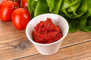 Tomato puree sauce for cooking photo