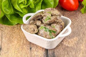 Chicken liver with cream sauce photo