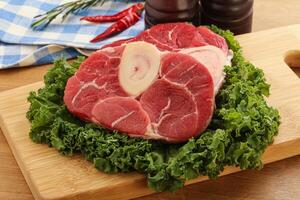 Raw ossobuco beef meat for cooking photo