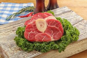 Raw ossobuco beef meat for cooking photo