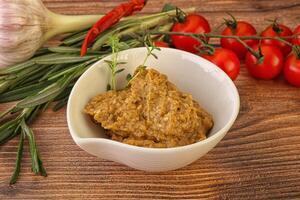 Jewish eggplant dip with oil photo