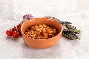 White beans in tomato sauce photo