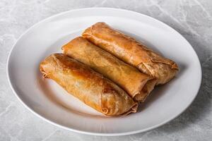 Traditional crispy fried stuffed springroll photo