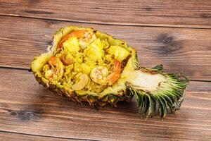 Thai cuisine - rice with prawn in pineapple photo