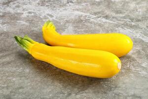 Yellow young zucchini for cooking photo