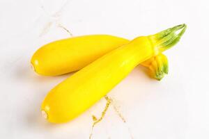 Yellow young zucchini for cooking photo