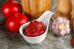 Natural organic red tomato paste photo