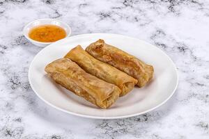 Traditional crispy fried stuffed springroll photo