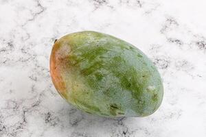 Ripe sweet green tropic mango photo