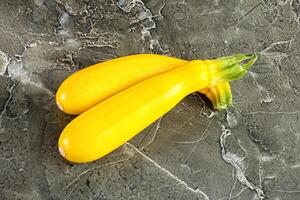 Yellow young zucchini for cooking photo