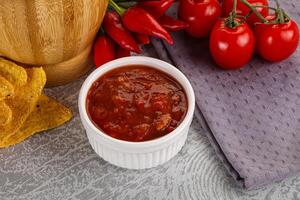 Spicy mexican sauce Salsa dip photo