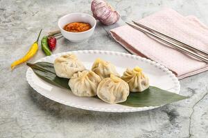 Chinese traditional steamed dumpligs momo photo