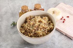 Vegan cuisine - boiled quinoa cereal photo