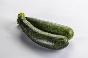 Raw young small green zucchini photo