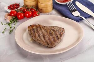 Grilled marble beef steak with sauce photo