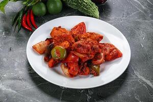 Indian cuisine - chicken tikka barbecue photo