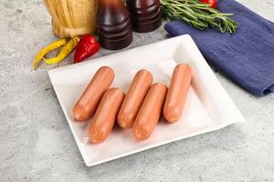 Boiled sausages for breakfast photo