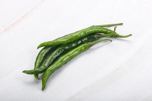 Hot and spicy green chili pepper photo