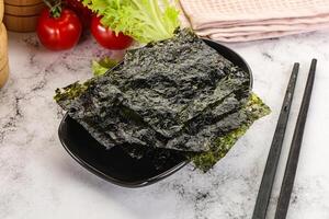 Korean cuisine - Nori chips in the bowl photo