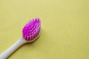 Closeup photo of used old toothbrush