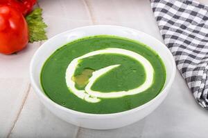 Vegetarian cuisine spinach cream soup photo