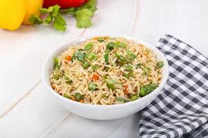 Indian vegetarian cuisine rice with vegetables photo