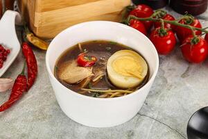 Japanese Miso soup with chicken photo