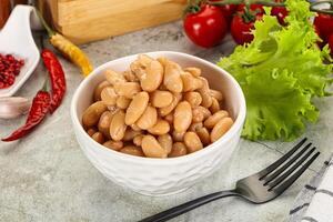 White canned beans in the bowl photo