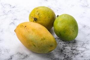 Fresh sweet and juicy mango heap photo