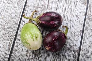 Heap of raw asian baby eggplant photo