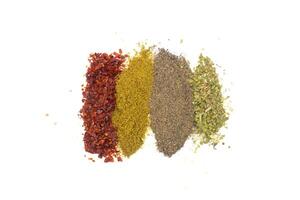 Various mixed spices isolated on a white background. Top view, flat lay. photo
