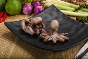 Delicous luxury seafood - boiled octopus photo