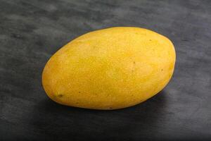 Sweet ripe juicy tropical mango fruit photo