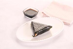 Japanese traditional onigiri with fish photo