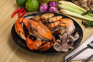 Luxury seafood mix - crab, prawn, octopus photo