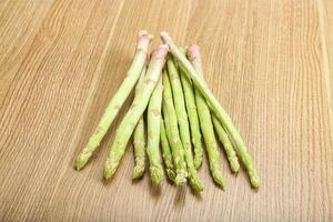 Raw green uncooked asparagus sprout photo