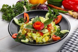 Vegetarian green avocado salad with basil photo