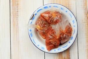 Indonesian Sambal Street Food Side Dish Packed on Plastic photo