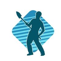 Silhouette of a worker carrying shovel tool. Silhouette of a worker in action pose using shovel tool. vector