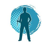 Silhouette of a man in worker costume carrying pick axe tool in action pose. Silhouette of a miner in action pose with pick axe tool. vector