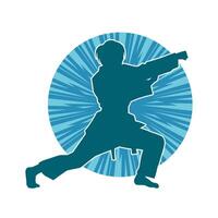 Silhouette of a slim female doing martial art pose. Silhouette of a martial art woman in action pose. vector