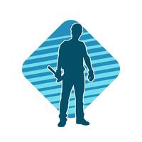 Silhouette of a worker carrying hammer tool. Silhouette of a worker in action pose using hammer tool. vector