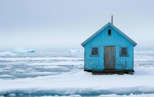 AI generated A lone cabin stands amidst a serene, icy landscape, surrounded by floating ice and reflected in the still water. photo